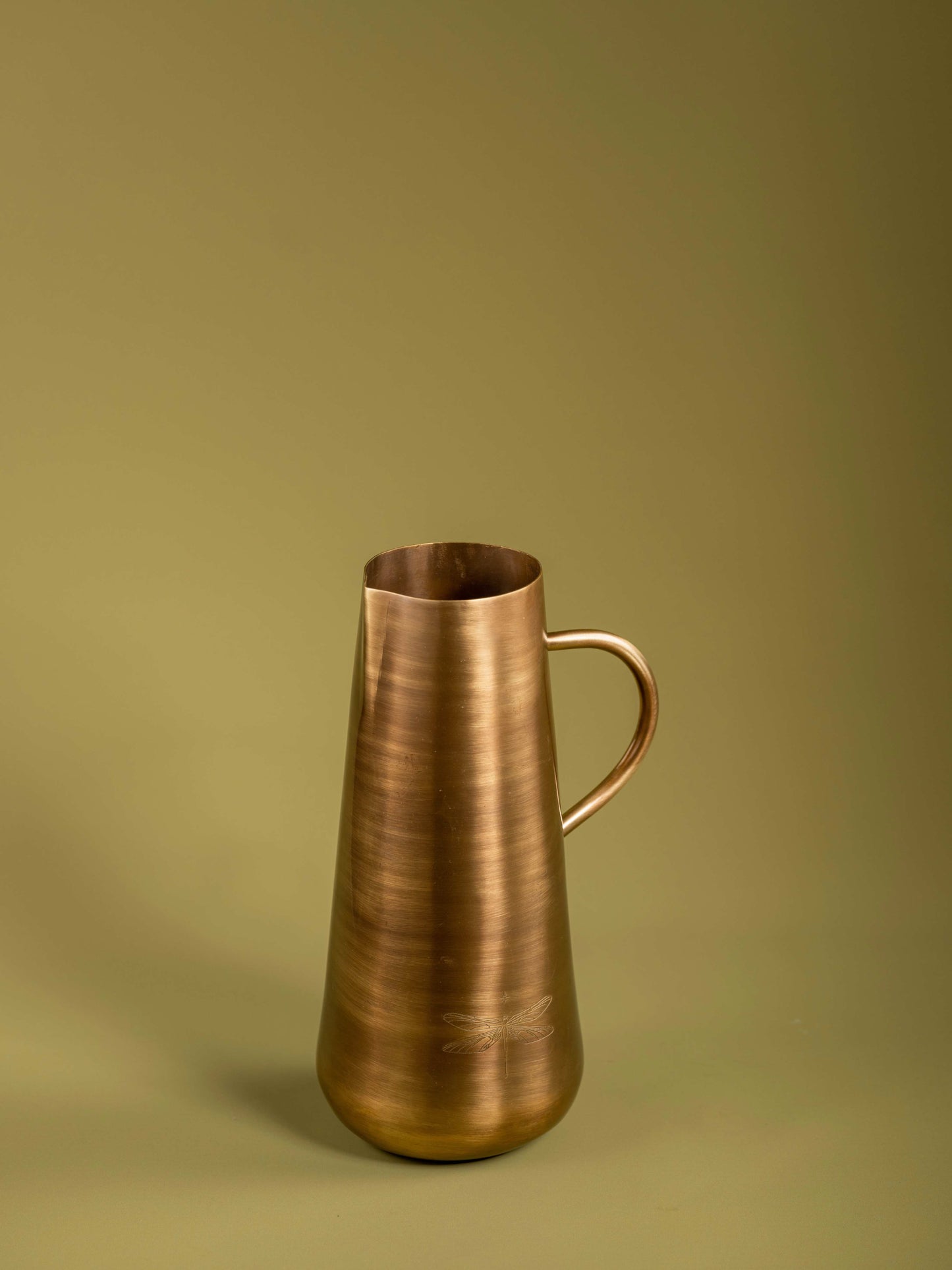 Jugnu - Beautiful brass jug with firefly motif