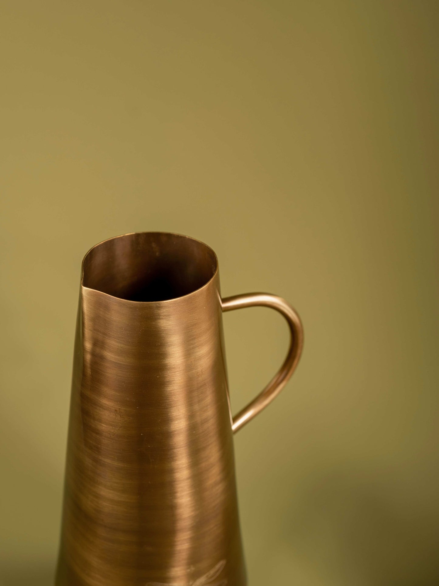 Jugnu - Beautiful brass jug with firefly motif
